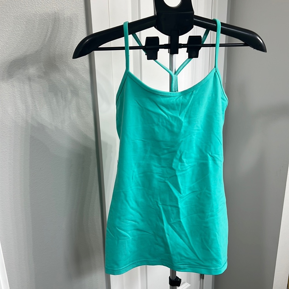Lululemon Power Y yoga tank with shelf bra. Size 8. Teal color. Lightly used.